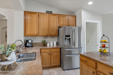 Set on a prime corner lot, this beautifully maintained Laredo on Saddlebrooke Golf Course in Arizona - for sale on GolfHomes.com, golf home, golf lot