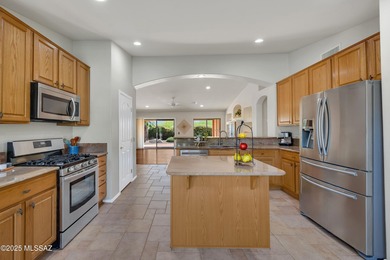 Set on a prime corner lot, this beautifully maintained Laredo on Saddlebrooke Golf Course in Arizona - for sale on GolfHomes.com, golf home, golf lot