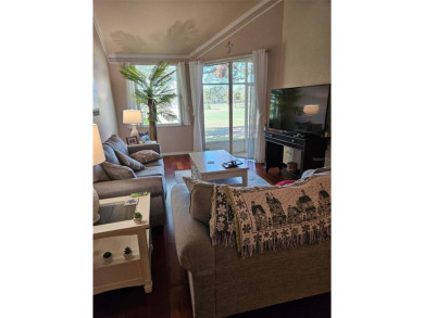 You will want to check out this beautiful town home that opens on East Bay Golf Club in Florida - for sale on GolfHomes.com, golf home, golf lot