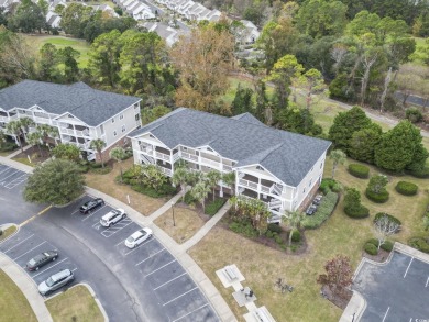 Welcome to this rare 1st-floor, 2-bedroom, 2-bathroom end-unit on Barefoot Resort and Golf Club  in South Carolina - for sale on GolfHomes.com, golf home, golf lot