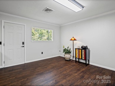 Located just minutes from the Blue Ridge Parkway, sits an on Grassy Creek Golf and Country Club in North Carolina - for sale on GolfHomes.com, golf home, golf lot