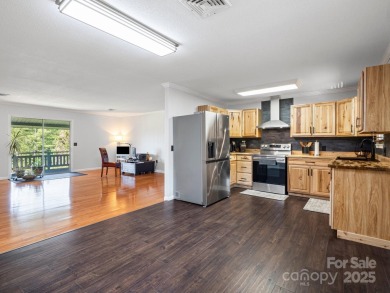 Located just minutes from the Blue Ridge Parkway, sits an on Grassy Creek Golf and Country Club in North Carolina - for sale on GolfHomes.com, golf home, golf lot