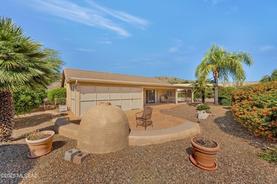 Set on a prime corner lot, this beautifully maintained Laredo on Saddlebrooke Golf Course in Arizona - for sale on GolfHomes.com, golf home, golf lot