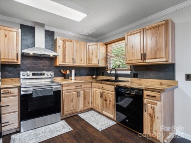 Located just minutes from the Blue Ridge Parkway, sits an on Grassy Creek Golf and Country Club in North Carolina - for sale on GolfHomes.com, golf home, golf lot