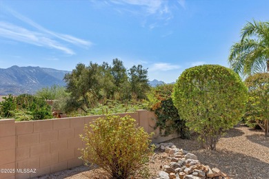 Set on a prime corner lot, this beautifully maintained Laredo on Saddlebrooke Golf Course in Arizona - for sale on GolfHomes.com, golf home, golf lot