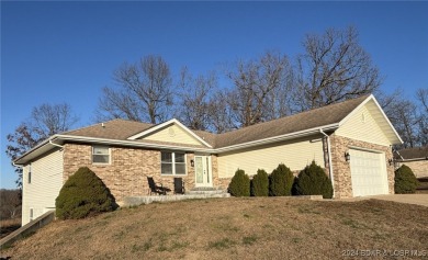 Come enjoy this peaceful setting on a very quiet street located on Indian Rock Golf Club in Missouri - for sale on GolfHomes.com, golf home, golf lot