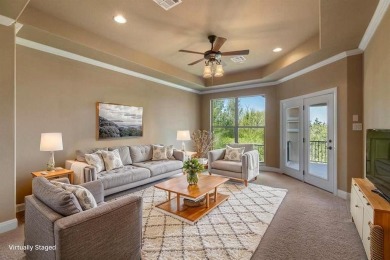 This isn't just a home - it's a lifestyle upgrade.  Step inside on University of Texas Golf Club in Texas - for sale on GolfHomes.com, golf home, golf lot