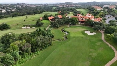 This isn't just a home - it's a lifestyle upgrade.  Step inside on University of Texas Golf Club in Texas - for sale on GolfHomes.com, golf home, golf lot