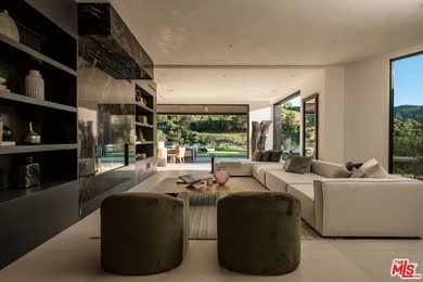 A Contemporary Sanctuary in TarzanaOverlooking the manicured on  in California - for sale on GolfHomes.com, golf home, golf lot