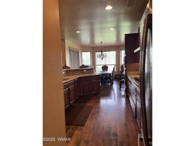 This stunning home is perfectly positioned off the 18th green in on Torreon Golf Club in Arizona - for sale on GolfHomes.com, golf home, golf lot