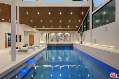 A Contemporary Sanctuary in TarzanaOverlooking the manicured on  in California - for sale on GolfHomes.com, golf home, golf lot