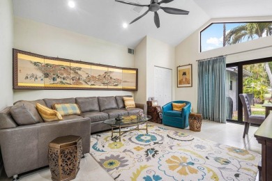 Nestled in the prestigious Boca Woods Country Club, meticulously on Boca Woods Country Club in Florida - for sale on GolfHomes.com, golf home, golf lot