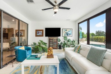 Nestled in the prestigious Boca Woods Country Club, meticulously on Boca Woods Country Club in Florida - for sale on GolfHomes.com, golf home, golf lot