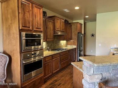 This stunning home is perfectly positioned off the 18th green in on Torreon Golf Club in Arizona - for sale on GolfHomes.com, golf home, golf lot