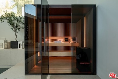 A Contemporary Sanctuary in TarzanaOverlooking the manicured on  in California - for sale on GolfHomes.com, golf home, golf lot