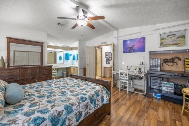 Welcome to this lovely two-bedroom, two-bath home located in the on Orange Blossom Hills Golf and Country Club in Florida - for sale on GolfHomes.com, golf home, golf lot