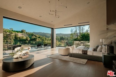 A Contemporary Sanctuary in TarzanaOverlooking the manicured on  in California - for sale on GolfHomes.com, golf home, golf lot