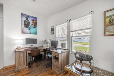 Welcome to this lovely two-bedroom, two-bath home located in the on Orange Blossom Hills Golf and Country Club in Florida - for sale on GolfHomes.com, golf home, golf lot