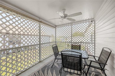 Welcome to this lovely two-bedroom, two-bath home located in the on Orange Blossom Hills Golf and Country Club in Florida - for sale on GolfHomes.com, golf home, golf lot