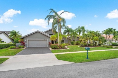 Nestled in the prestigious Boca Woods Country Club, meticulously on Boca Woods Country Club in Florida - for sale on GolfHomes.com, golf home, golf lot