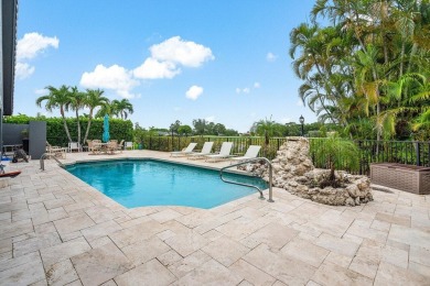 Nestled in the prestigious Boca Woods Country Club, meticulously on Boca Woods Country Club in Florida - for sale on GolfHomes.com, golf home, golf lot
