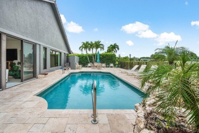 Nestled in the prestigious Boca Woods Country Club, meticulously on Boca Woods Country Club in Florida - for sale on GolfHomes.com, golf home, golf lot