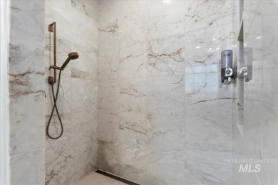Perfection and artistry converge in this architectural on SpurWing Country Club in Idaho - for sale on GolfHomes.com, golf home, golf lot