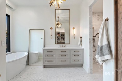 Perfection and artistry converge in this architectural on SpurWing Country Club in Idaho - for sale on GolfHomes.com, golf home, golf lot