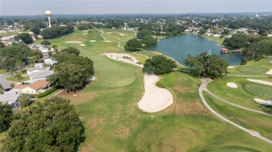 Welcome to this lovely two-bedroom, two-bath home located in the on Orange Blossom Hills Golf and Country Club in Florida - for sale on GolfHomes.com, golf home, golf lot