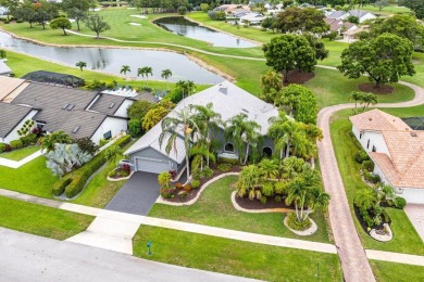 Nestled in the prestigious Boca Woods Country Club, meticulously on Boca Woods Country Club in Florida - for sale on GolfHomes.com, golf home, golf lot