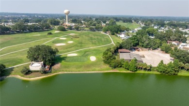 Welcome to this lovely two-bedroom, two-bath home located in the on Orange Blossom Hills Golf and Country Club in Florida - for sale on GolfHomes.com, golf home, golf lot