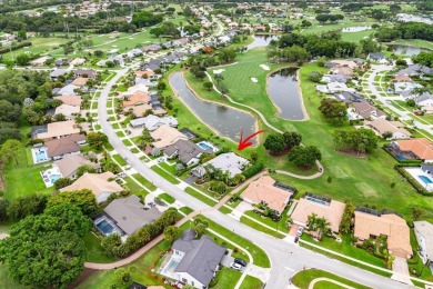 Nestled in the prestigious Boca Woods Country Club, meticulously on Boca Woods Country Club in Florida - for sale on GolfHomes.com, golf home, golf lot