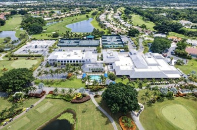 Nestled in the prestigious Boca Woods Country Club, meticulously on Boca Woods Country Club in Florida - for sale on GolfHomes.com, golf home, golf lot
