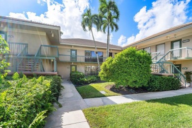 Nestled in a secluded tropical enclave of the Sandpiper section on Quail Ridge Golf Course and Country Club in Florida - for sale on GolfHomes.com, golf home, golf lot