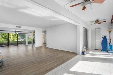 Nestled in a secluded tropical enclave of the Sandpiper section on Quail Ridge Golf Course and Country Club in Florida - for sale on GolfHomes.com, golf home, golf lot