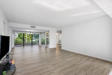 Nestled in a secluded tropical enclave of the Sandpiper section on Quail Ridge Golf Course and Country Club in Florida - for sale on GolfHomes.com, golf home, golf lot
