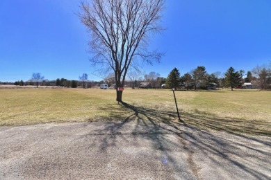 Quiet country living on a spacious lot! This nearly acre lot is on Decatur Lake Golf Course in Wisconsin - for sale on GolfHomes.com, golf home, golf lot