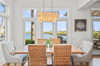 This stunning three-story waterfront residence offers 4 spacious on Palmilla Beach Golf Club in Texas - for sale on GolfHomes.com, golf home, golf lot