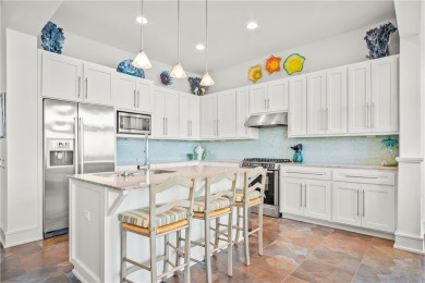 This stunning three-story waterfront residence offers 4 spacious on Palmilla Beach Golf Club in Texas - for sale on GolfHomes.com, golf home, golf lot