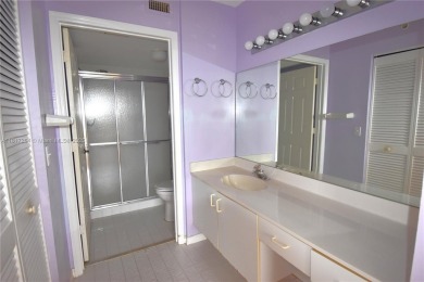 Spacious 2-bedroom 2 bath condo offers a good size kitchen with on Sunrise Lakes Phase IV Golf Course in Florida - for sale on GolfHomes.com, golf home, golf lot