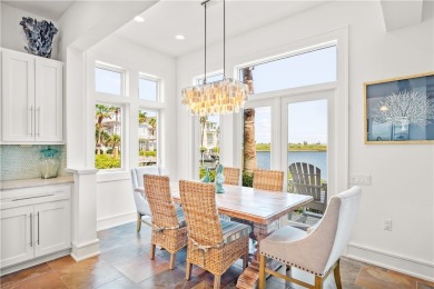 This stunning three-story waterfront residence offers 4 spacious on Palmilla Beach Golf Club in Texas - for sale on GolfHomes.com, golf home, golf lot