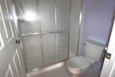 Spacious 2-bedroom 2 bath condo offers a good size kitchen with on Sunrise Lakes Phase IV Golf Course in Florida - for sale on GolfHomes.com, golf home, golf lot