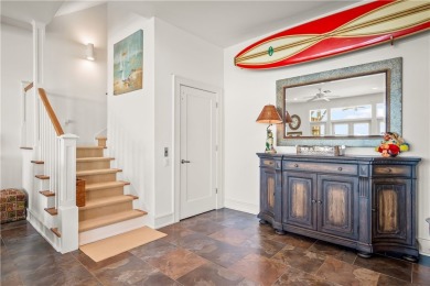 This stunning three-story waterfront residence offers 4 spacious on Palmilla Beach Golf Club in Texas - for sale on GolfHomes.com, golf home, golf lot