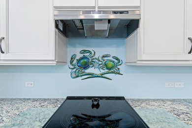 Coastal charm meets effortless living in this beautifully on Members Club At St. James Plantation in North Carolina - for sale on GolfHomes.com, golf home, golf lot