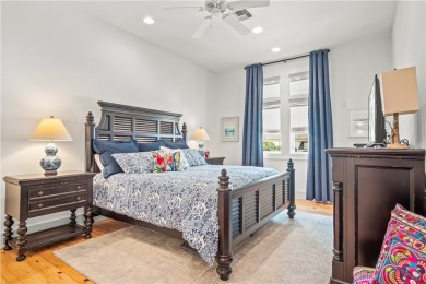 This stunning three-story waterfront residence offers 4 spacious on Palmilla Beach Golf Club in Texas - for sale on GolfHomes.com, golf home, golf lot