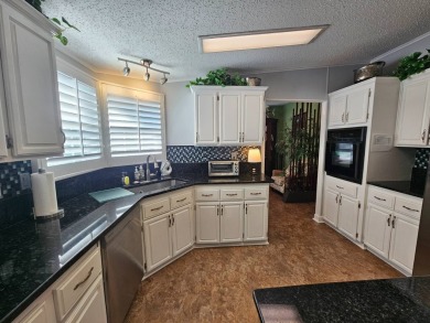 This spacious 2-bedroom, 2 bath, 2 den home is massive and a on Big Cypress Golf and Country Club in Florida - for sale on GolfHomes.com, golf home, golf lot