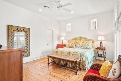 This stunning three-story waterfront residence offers 4 spacious on Palmilla Beach Golf Club in Texas - for sale on GolfHomes.com, golf home, golf lot