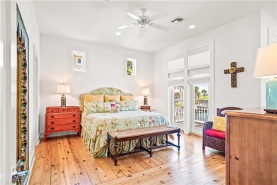 This stunning three-story waterfront residence offers 4 spacious on Palmilla Beach Golf Club in Texas - for sale on GolfHomes.com, golf home, golf lot