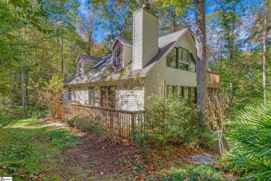 This charming mountain getaway offers a great location for all on The Rock At Jocassee in South Carolina - for sale on GolfHomes.com, golf home, golf lot