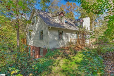 This charming mountain getaway offers a great location for all on The Rock At Jocassee in South Carolina - for sale on GolfHomes.com, golf home, golf lot